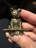 Brass samurai cat