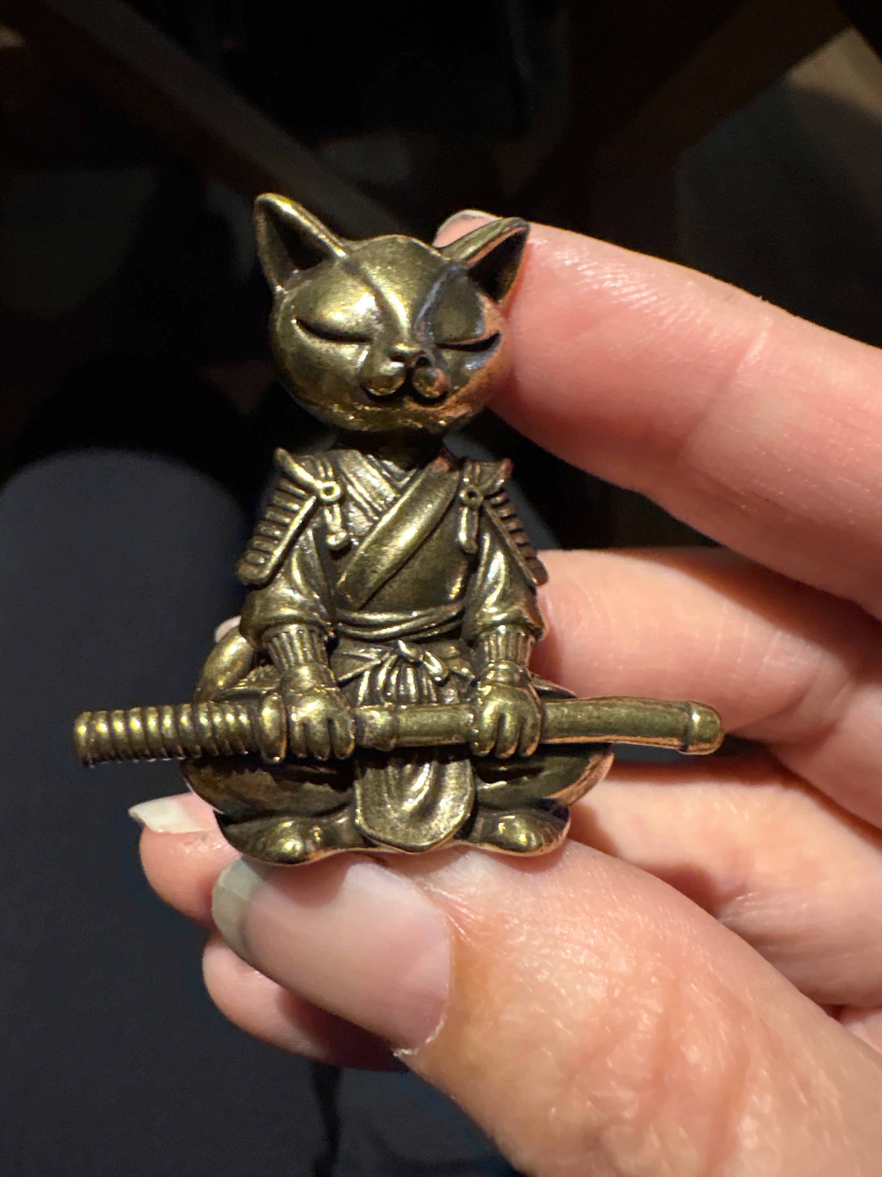 Brass samurai cat